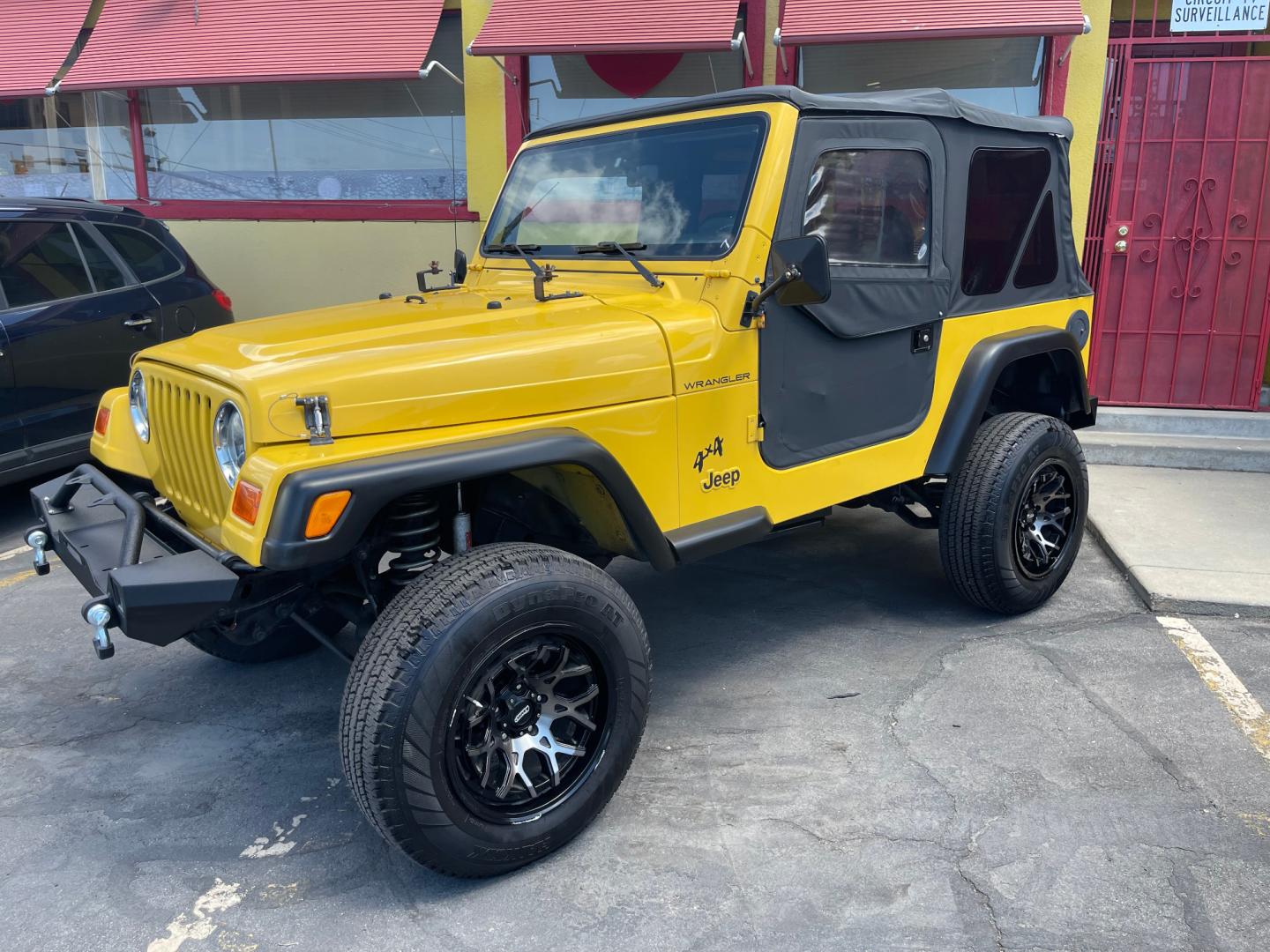 2000 Solar Yellow /Black Jeep Wrangler SE (1J4FA29P9YP) with an 2.5L 4 Cyl. engine, Manual transmission, located at 801 South State Street, Salt Lake City, UT, 84111, (801) 328-0098, 40.751953, -111.888206 - Wow extremely rare to find extra clean Jeep in immaculate condition 4x4! Low miles only 98,248 miles! Interior and exterior are both in excellent shape for the year. This is a clean title no reported accidents on the CarFax history report. It has passed emissions already and is ready to go. Featur - Photo#8